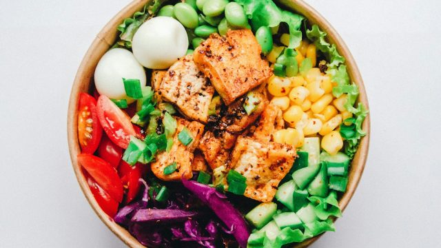 Balanced bowl with vegetables, grains, and protein